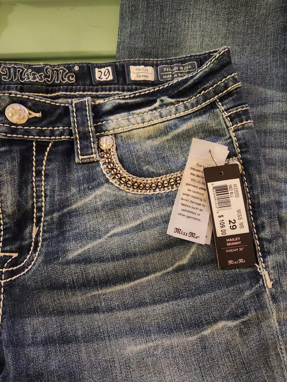 Miss Me Skinny Jeans in Faded Blue Wash with Embellished Pocket - Picture 1 of 3
